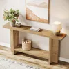 A wooden console table with decorative items and a lamp. Podgląd zdjęcia produktu