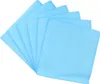 A stack of light blue disposable pads fanned out. Voir les images du produit