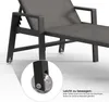 Close-up of the wheel and leg of a gray lounge chair, with a magnified inset showing the wheel detail. Náhled obrázku produktu