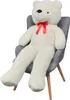 A large white teddy bear with a red bow sits on a gray chair. Náhled obrázku produktu