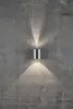 A silver cylinder-shaped LED wall light mounted on a textured gray concrete wall, casting light upwards and downwards. Anteprima dell’immagine prodotto