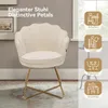 A cream-colored velvet chair with gold legs is shown in a room setting, with icons indicating different uses for the chair. Voir les images du produit