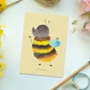 Mr. & Mrs. Panda Postkarte Hummel flauschig - Gelb Pastell Produktbild-Vorschau 2