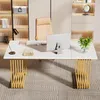 A modern white desk with gold legs in an office setting. Anteprima dell’immagine prodotto