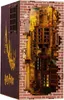 A detailed miniature model of Diagon Alley from Harry Potter, built into a brick wall structure. The model is lit from within, illuminating the shops and alleyway. Produktbild-Vorschau