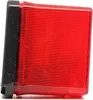 A close-up studio shot of a red and black automotive tail light. Anteprima dell’immagine prodotto