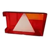 A red and orange trailer light with a white triangle reflector. Produktbild-Vorschau