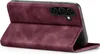 A burgundy flip case for a smartphone is shown from a diagonal angle, with the front cover open. Produktbild-Vorschau
