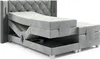 A grey adjustable bed with a tufted headboard is shown from a side angle against a white background. Produktbild-Vorschau