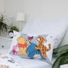 A Winnie the Pooh themed pillow on a bed. Anteprima dell’immagine prodotto