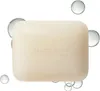 A bar of soap with the brand name embossed on it, surrounded by water bubbles. Podgląd zdjęcia produktu