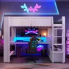 A loft bed with a desk and gaming setup underneath, featuring LED lighting. Náhled obrázku produktu