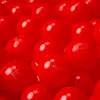 A close-up, tightly cropped view of many red balls, likely for a ball pit. Produktbild-Vorschau