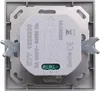 The back of a light switch or sensor with wiring terminals and technical markings. Produktbild-Vorschau