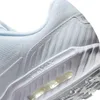 A close-up view of the side of a white Nike Air Max sneaker, showing the sole and part of the upper. Produktbild-Vorschau