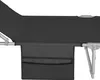 A close-up view of a folding lounge chair, showing its fabric and side pocket. Produktbild-Vorschau