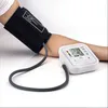 A person's arm is shown with a blood pressure cuff attached, connected to a digital blood pressure monitor. Anteprima dell’immagine prodotto