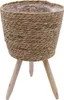 A woven plant stand with three wooden legs, shown against a white background. Produktbild-Vorschau