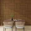 A dining table with chairs set against a wood-paneled wall. Anteprima dell’immagine prodotto