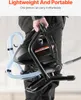 A person is holding a black airless paint sprayer with a blue hose attached. Produktbild-Vorschau
