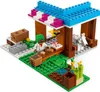 A LEGO Minecraft bakery set with a minifigure, a goat, and various building elements. Podgląd zdjęcia produktu