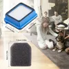 A family and their dog are relaxing in a living room, with vacuum cleaner filters displayed in the foreground with dimensions. Produktbild-Vorschau