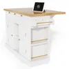 A white kitchen island with a wooden countertop, featuring drawers, cabinets, shelves, and integrated power outlets, with a tablet charging on top. Produktbild-Vorschau