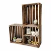 A set of wooden crates stacked to form shelves, decorated with various items. Anteprima dell’immagine prodotto