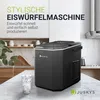 A black ice maker sits on a marble countertop in a kitchen setting, with a glass of ice water in the foreground. Produktbild-Vorschau