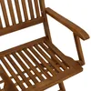 A close-up view of a wooden garden chair, focusing on the armrest and seat. Produktbild-Vorschau