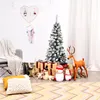 A festive Christmas scene with a flocked artificial Christmas tree, gifts, snowmen, and a reindeer decoration. Produktbild-Vorschau