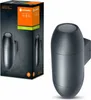 A product shot of a dark gray outdoor wall light and its packaging. Produktbild-Vorschau