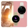 A woman stretching in bed with sunlight streaming in, next to two smartwatches displaying health data. Podgląd zdjęcia produktu