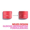 Two jars of hair mask are shown side-by-side with an arrow indicating a change from the left jar to the right jar, implying a redesign. Text below highlights "New Design, Same Great Formulation". Náhled obrázku produktu
