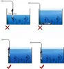 Diagrams showing correct and incorrect placement of an aquarium heater. Voir les images du produit