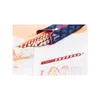 A pencil case filled with colored pencils is placed on a table next to children's drawings. Produktbild-Vorschau