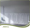 A wall with decorative panels and a radiator. Podgląd zdjęcia produktu