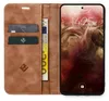 A brown leather flip case for a smartphone, with cards and currency inserted. Produktbild-Vorschau