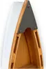 A close-up view of the top of a wooden shelf shaped like a boat, showing the construction details. Podgląd zdjęcia produktu