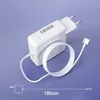 A white Apple MacBook charger with a white coiled cable and a magnetic T-type connector, shown on a light purple background. A dashed line with the text '180cm' indicates the cable length. Produktbild-Vorschau