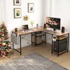 An L-shaped desk set up for home office use with a Christmas tree in the corner. Anteprima dell’immagine prodotto