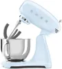 A light blue SMEG stand mixer with a silver bowl and mixing attachments, shown from a side angle on a white background. Anteprima dell’immagine prodotto