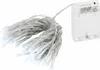 A string of white LED lights with a clear battery pack. Produktbild-Vorschau