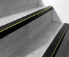 Close-up view of stair nosing profiles on a set of stairs. Produktbild-Vorschau