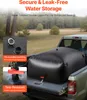A black water storage bladder filled with water is placed in the bed of a pickup truck, with a natural outdoor background. Náhled obrázku produktu