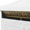 A close-up view of a white mailbox with gold lettering. Produktbild-Vorschau