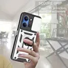 A hand holding a phone case with a ring holder and camera protection. Produktbild-Vorschau