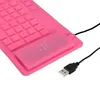 A close-up shot of a pink silicone keyboard and its USB cable. Podgląd zdjęcia produktu
