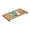 A bamboo cutting board with a label on it, shown on a white background. Podgląd zdjęcia produktu