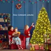 A family decorating a Christmas tree in a living room. Voir les images du produit